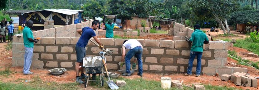 A group of volunteers work at the construction site at a Building project abroad Volunteers make an impact at an international Building project