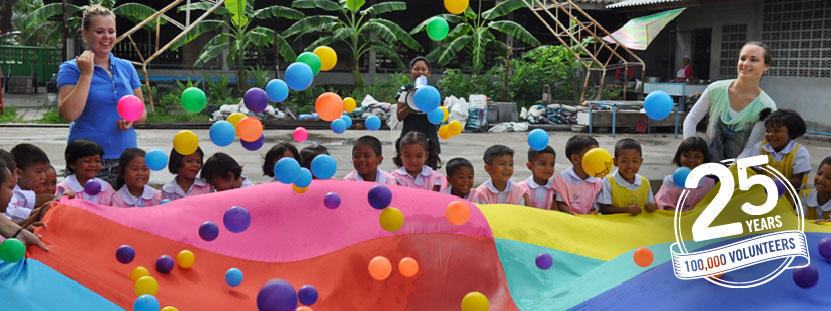 Care volunteers spend time with local children at their placement abroad Two volunteers run an activity for children at a Care placement