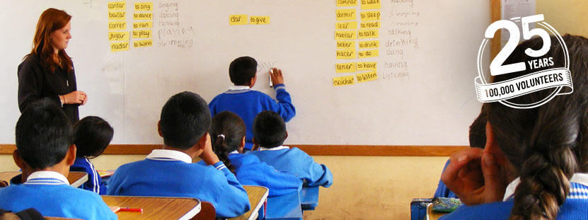 Teaching English on a Volunteer Project with Children in Peru Volunteer teaches a vocabulary lesson in a school in the Sacred Valley of the Incas, Peru